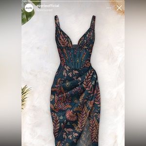 Paisley cocktail dress. Deep plunge.